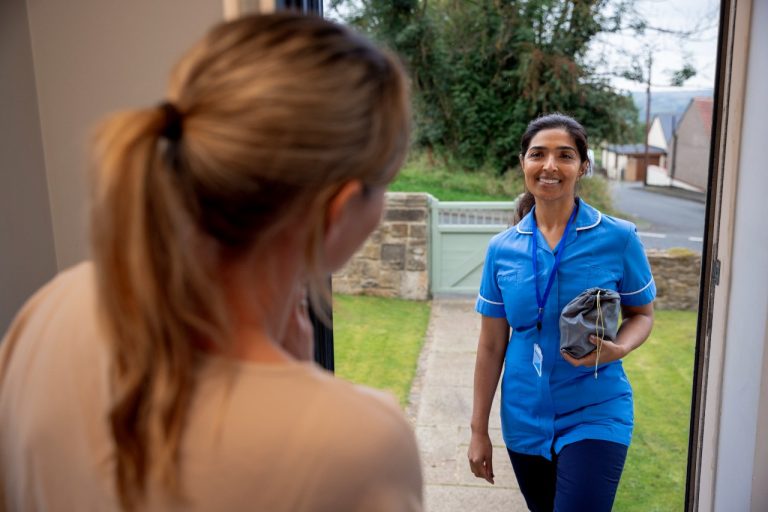 Nurse arrives at doorstep